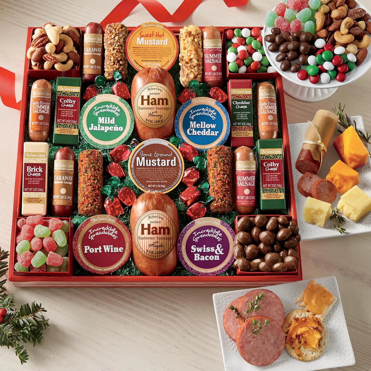 Assorted Holiday Treats with Ham Summer Sausages, Chocolates, Cheese Bars and Logs, and Candy A213